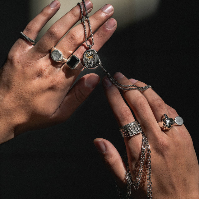 Silver rings on fingers