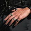 pinky signet ring on finger